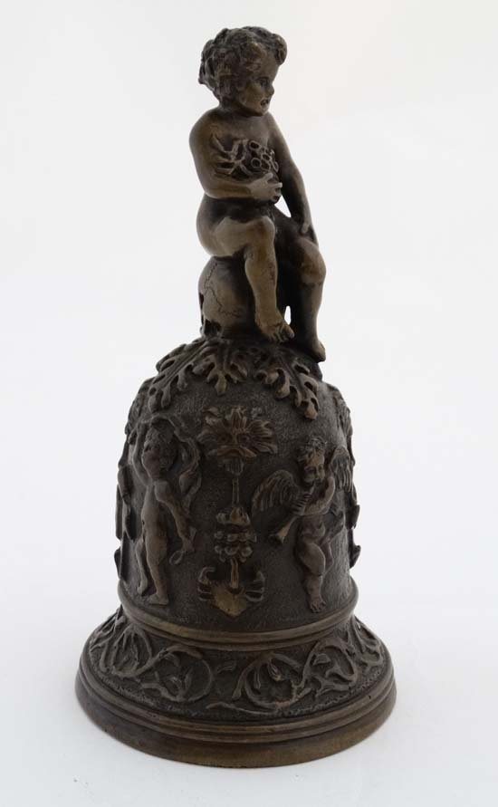 An old Italian bronze bell with handle formed as a (1 of 5)