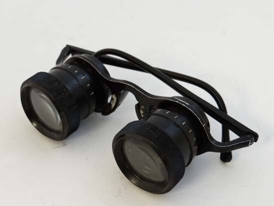 A pair of unusual binocular glasses: A pair of unusual binocular glasses
