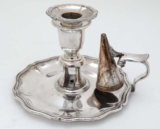 A 19thC Old Sheffield plate chamber stick with loop: A 19thC Old Sheffield plate chamber stick with loop handle and conical snuffer. Approx 4" high