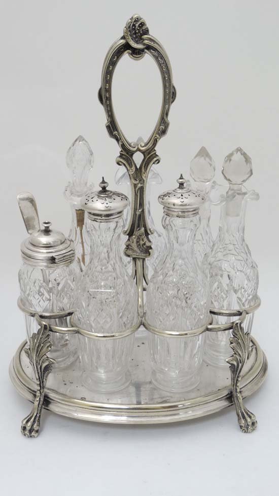 A late 19thC / early 20thC silver plate 7-bottle cruet (1 of 5)