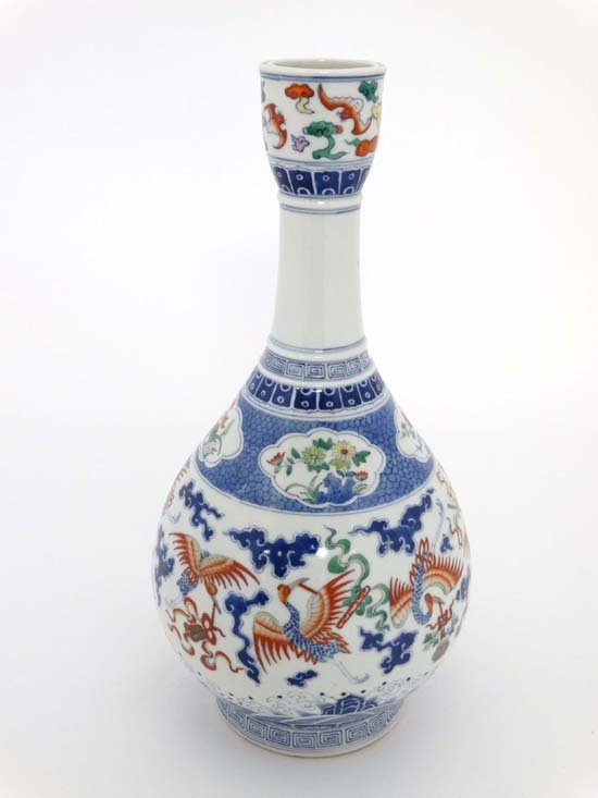 A Chinese porcelain bottle vase decorated with cranes i (1 of 4)