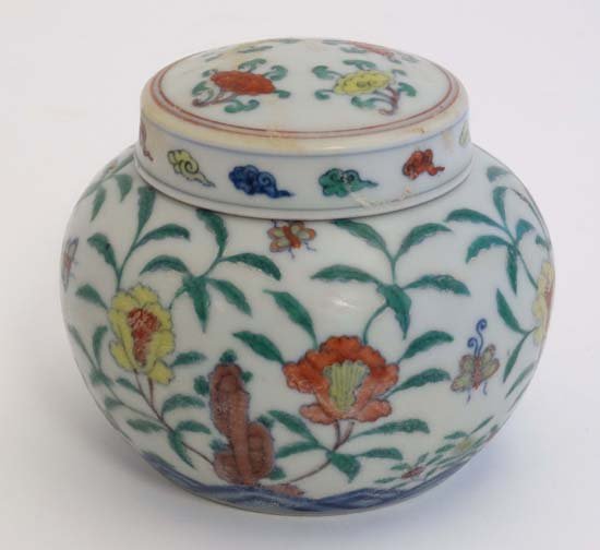 A small Chinese lidded ginger jar , handpainted in poly (1 of 6)