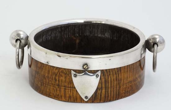 An early 20thC silver plate and oak bottle coaster 5''  (1 of 5)