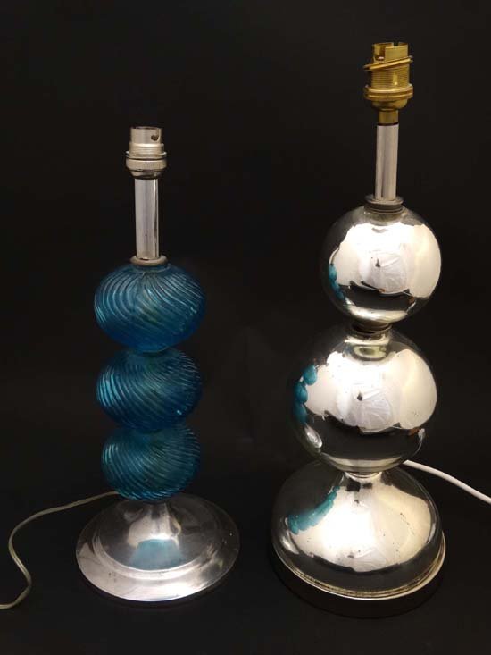 Vintage Retro :Two retro table lamps , one of tapering: Vintage Retro :Two retro table lamps , one of tapering mirrored glass spheres , the other other of ridged blue glass spheres ( 3) on a cast aluminium base, 17'' & 15'' high respectively.