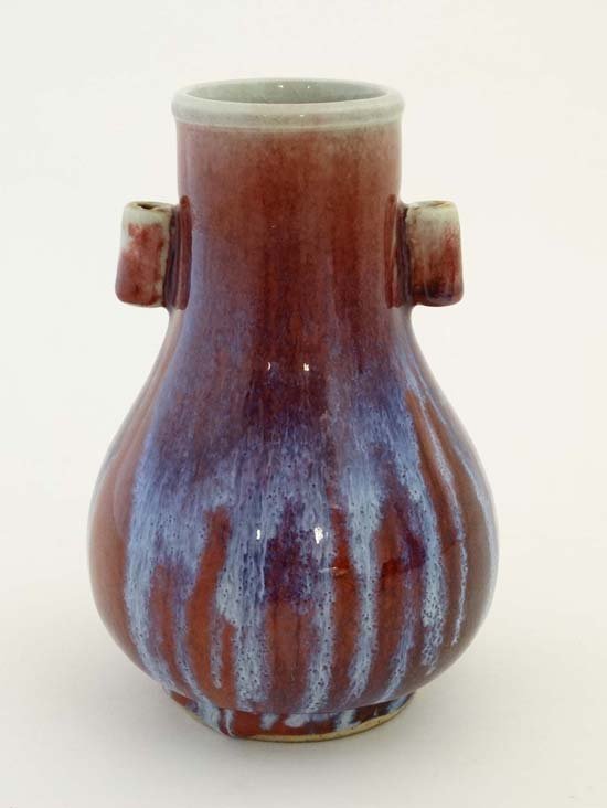 A Chinese Sang De Beouf two handled vase with purple (1 of 5)