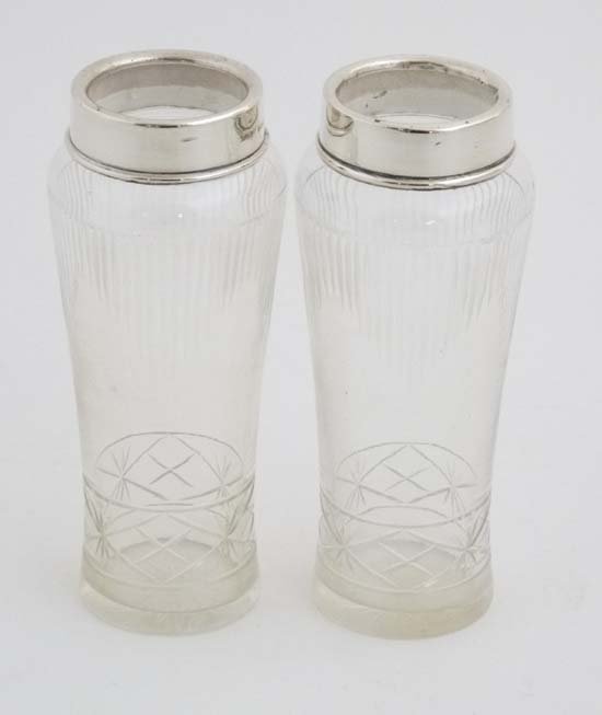 A pair of cut glass vases with silver rims hallmarked (1 of 5)