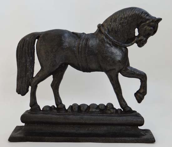 A 19thC cast iron door porter / door stop in the form (1 of 4)