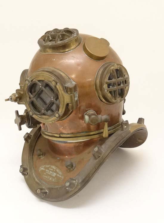 Please note amended description: Please note amended description: A late 20thC Dry Suit Diving Helmet, the shoulder section with oval plaque marked '' US Navy Diving Helmet Mark V, Morse Diving Equipment Co Inc, Boston Mass, 8 - 29 -