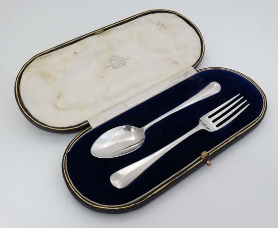 A silver christening spoon and fork hallmarked London (1 of 5)