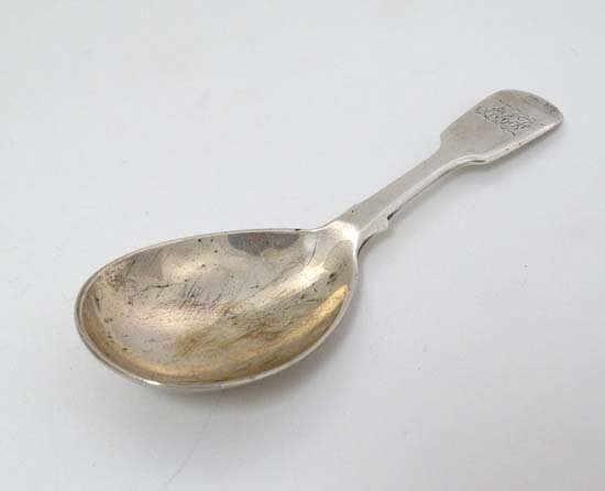 A Victorian silver fiddle pattern caddy spoon.: A Victorian silver fiddle pattern caddy spoon. Hallmarked London 1859 maker Charles Stuart Harris. 4 ¼'' long (19g)