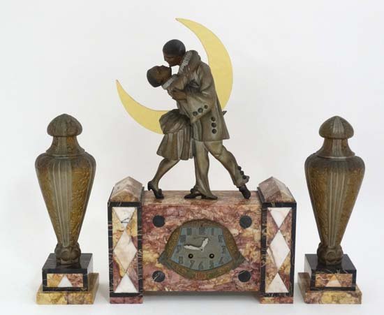 Art Deco clock : A rare romantic French garniture de: Art Deco clock : A rare romantic French garniture de cheminee clock with typical 8 day Paris Movement striking on the hour and half hour on a bell via a countwheel , bearing the markers initials ''JR'