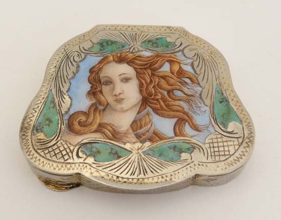 Vintage powder compact : A white metal powder compact: Vintage powder compact : A white metal powder compact of shaped form with enamel decoration to lid and traces of gilding. Indistinctly marked. 3 1/4'' wide