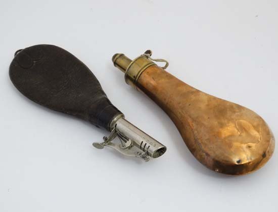 Shooting : A mid-19thC copper and brass powder flask ,: Shooting : A mid-19thC copper and brass powder flask , together with a leather shot flask . The largest 8 1/4'' long