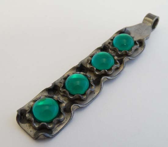 Scandinavian Jewellery - Bent Larsen Danish Modernist: Scandinavian Jewellery - Bent Larsen Danish Modernist jewellery : Danish pendant set with four green glass cabochon. Marked ' Bent Larsen Tin Denmark ' 3 1/4'' long