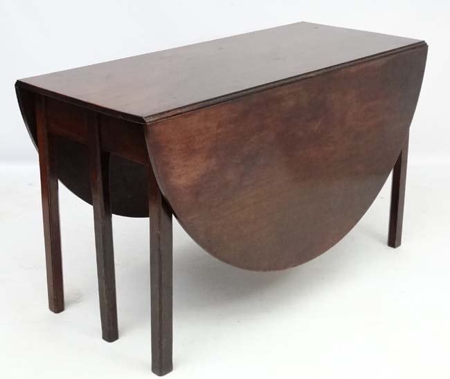 An 18thC Georgian mahogany dining table of oval (1 of 5)