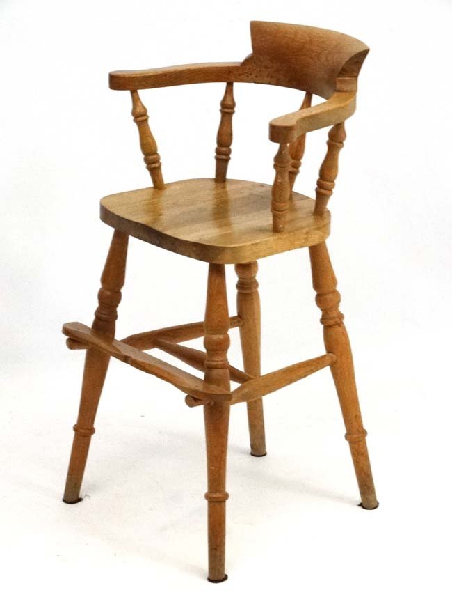 A 20thC Blonde oak childs high chair formed as a small: A 20thC Blonde oak childs high chair formed as a small smokers bow 31'' high