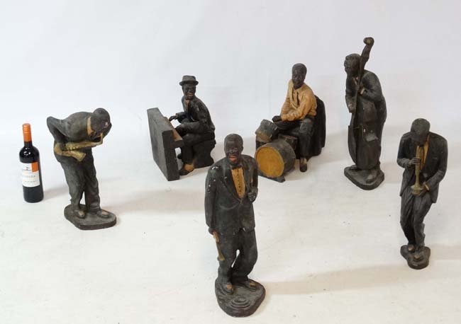 Art Deco : a set of 6 suited New Orleans Jazz Band: Art Deco : a set of 6 suited New Orleans Jazz Band figures, a singer with Trumpet, Double base player, Drummer, mute trumpeter, Piano player and piano, polychromed and made of fibre glass, the highest
