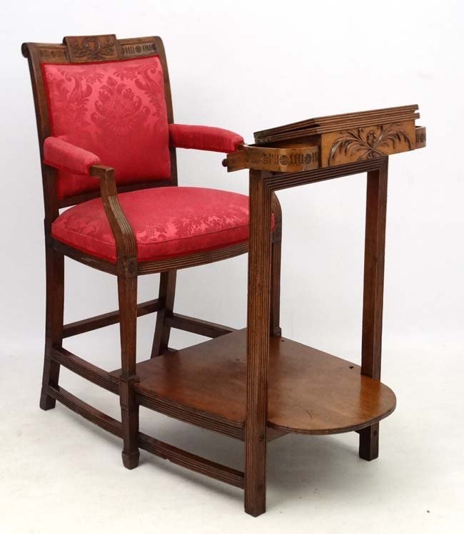 A late 18th / early 19th C Library Reading Chair with: A late 18th / early 19th C Library Reading Chair with integral folding stand of mahogany construction with reeded decoration . The generous sized chair with open arms. 56'' high x 53 1/2'' long x 28 1