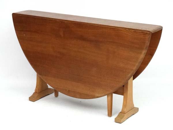 Vintage Retro : An Ercol blonde elm drop leaf table: Vintage Retro : An Ercol blonde elm drop leaf table with D ends , 50 1/2'' wide x 56 1/2'' extended.