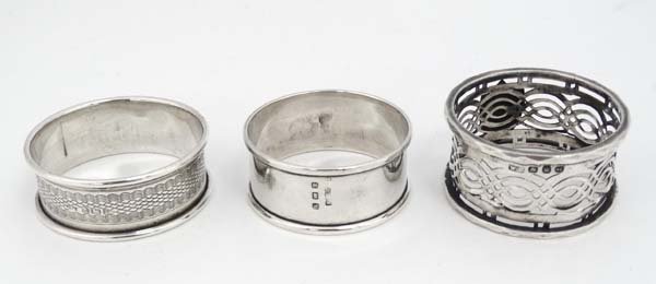 3 various silver napkin rings 1 x Birmingham 1930: 3 various silver napkin rings 1 x Birmingham 1930 maker E.S Barnsley & Co., 1 x Birmingham 1896 maker William Devenport and 1 x Birmingham 1920 maker John Thompson & Sons (3) (40g)