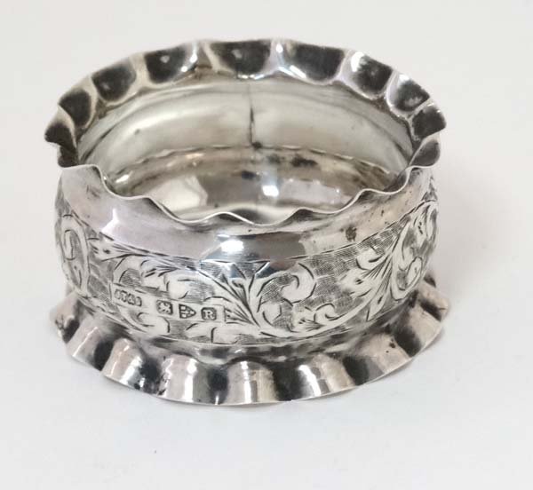 A silver napkin ring hallmarked Chester 1900 maker John: A silver napkin ring hallmarked Chester 1900 maker John Thompson & Sons (8g)