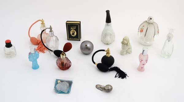 Glass: A collection of approximately 15 20th/21stC: Glass: A collection of approximately 15 20th/21stC scent bottles, to include examples by Anna Sui, Avon , Letheric London (Tweed), Hugo Boss (Boss) , Yves Saint Lauren, Goddess and others, both filled