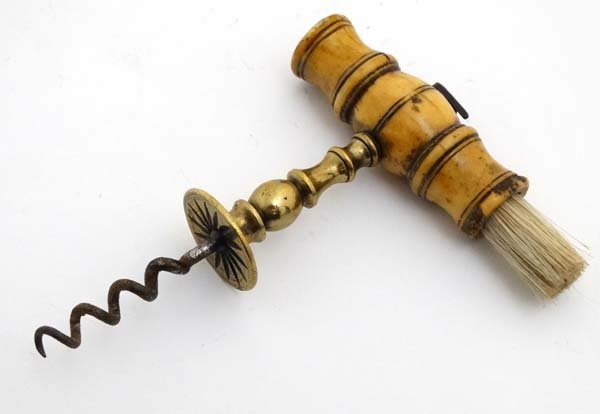 Corkscrew / Wine bottle Opener : A turned bone handled: Corkscrew / Wine bottle Opener : A turned bone handled Cork Screw , with dust brush, brass turned shaft , Henshall button and steel worm / Helix , 5 '' long In 1795, the first corkscrew patent was gra