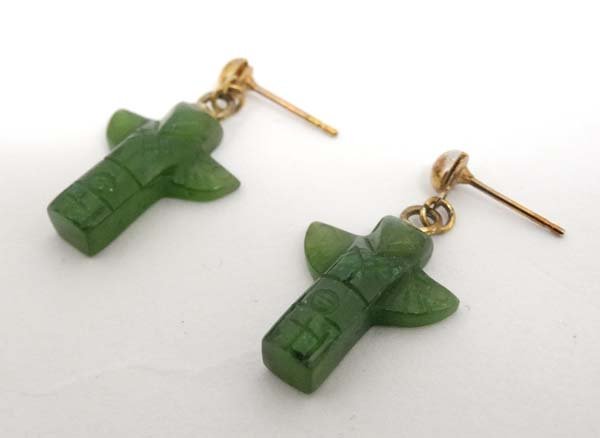 A pair of gilt metal drop earrings set with carved jade (1 of 3)