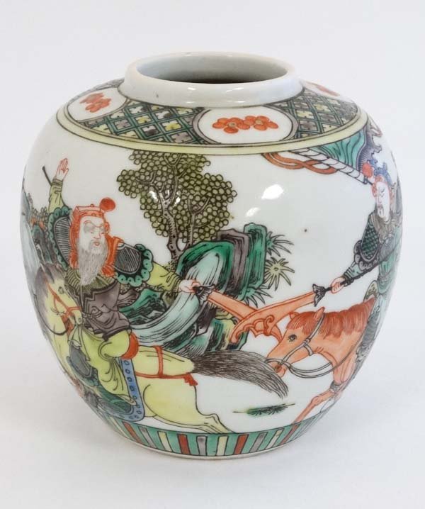 A Chinese Famille Verte Ginger jar decorated with: A Chinese Famille Verte Ginger jar decorated with warring figures on horseback. 5 1/4'' high.