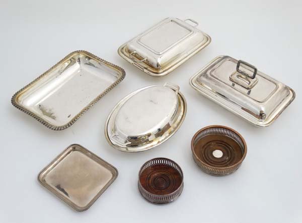 Assorted silver plated wares to include entree dishes,: Assorted silver plated wares to include entree dishes, bottle coasters etc