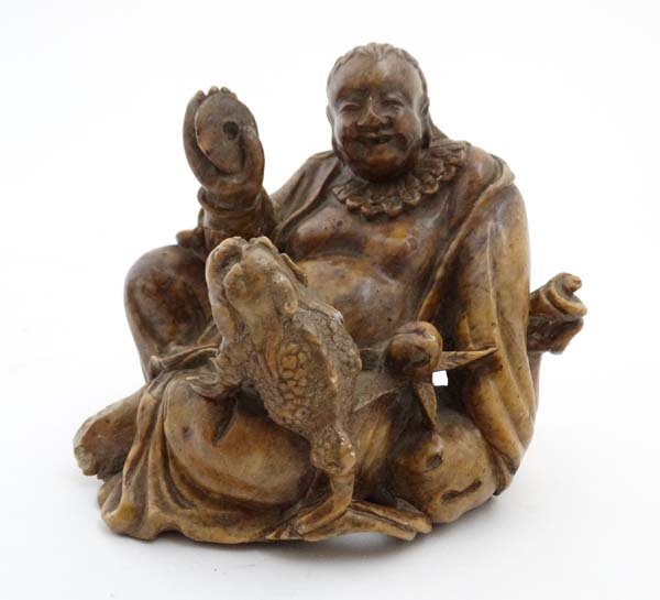 A 19thC Russet soapstone? carving of the 'happy' buddah: A 19thC Russet soapstone? carving of the 'happy' buddah bears remains of carved signature under. 2 3/4'' high