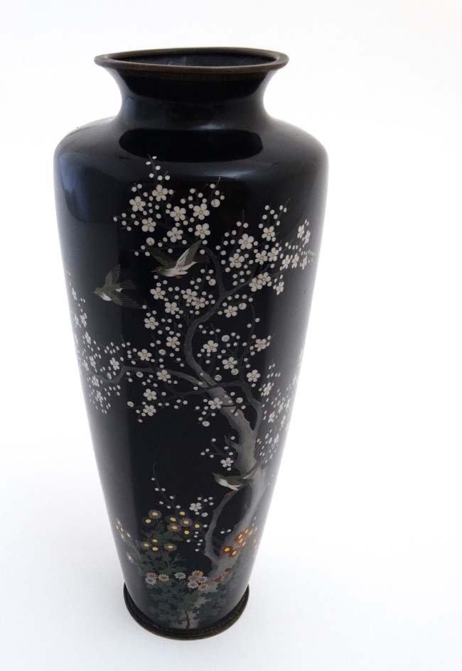 A Hayashi Kodenji studios style Cloisonne vase: A Hayashi Kodenji studios style Cloisonne vase depicting birds amongst flowering prunus. marked under 12'' high