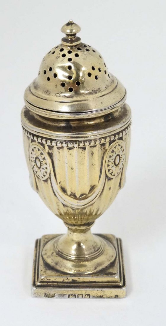 A silver gilt pepperette on squared base hallmarked: A silver gilt pepperette on squared base hallmarked 1903 maker Hawsksworth Eyre & Co. Ltd. 4'' high (60g)