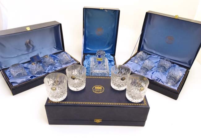 Thomas Webb Crystal : Cased crystal ware from the: Thomas Webb Crystal : Cased crystal ware from the Warwick range to include a decanter and stopper, 4 tumblers 3'' high , 4 tumblers 3 1/2'' high and 4 pedestal wine glasses. (4 boxes)