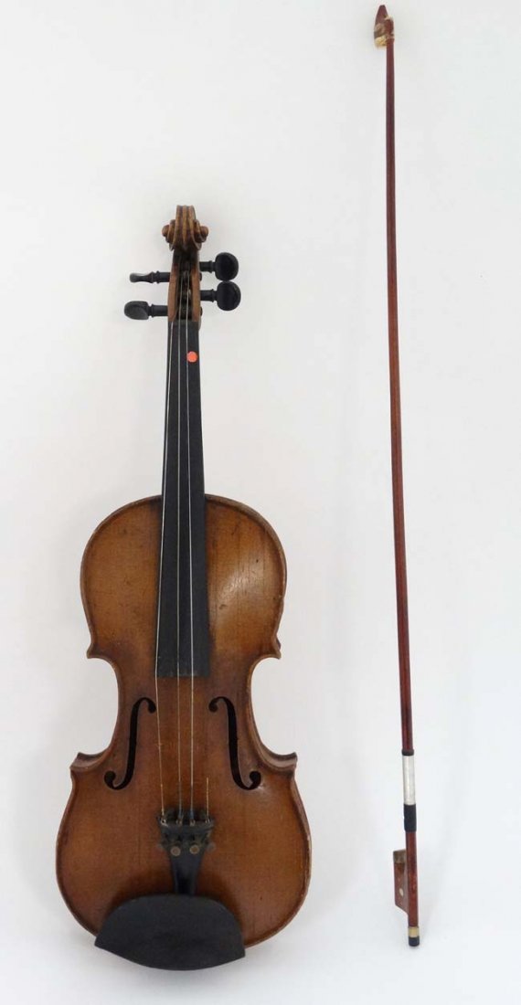 Musical Instruments : An unusual 19thC Violin , bearing: Musical Instruments : An unusual 19thC Violin , bearing label within ' John Breakenridge Parkhill 1932 . ' Together with associated bow . John Breckenridge ( 1790 - 1840 ) was a Scottish Poet , Weaver