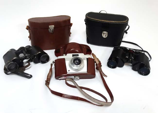 A set of mid 20thc Carl Zeiss '' Jena '' Deltrinem 8 x: A set of mid 20thc Carl Zeiss '' Jena '' Deltrinem 8 x 30 field binoculars in brown leather case and a set of Hanimex 8 x 30 field 7.5 binoculars in black case. Together with a German Agfa Silette 1:2