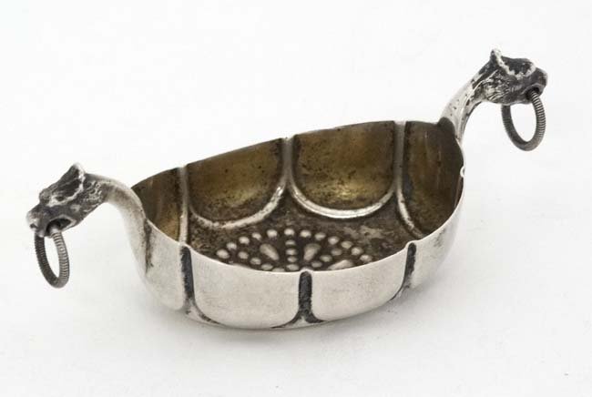 Scandinavian Silver : A Silver salt formed as a: Scandinavian Silver : A Silver salt formed as a stylised Norwegian long boat with figural dragon head like handles. Marked under 830 MH Marius Hammer 3'' long