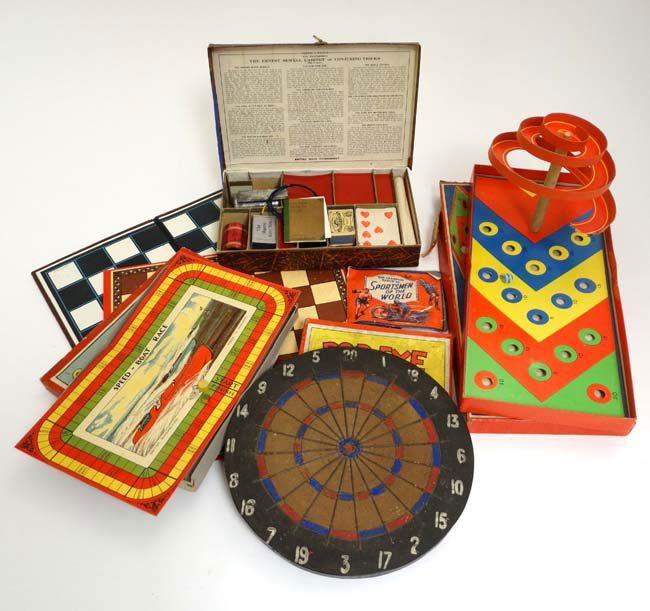 A collection of retro toys to include a wooden dart: A collection of retro toys to include a wooden dart board, The Ernest Sewell Cabinet of Conjuring Tricks, a boxed Joy Glide Game, a Peter Pan Series 'Pop-Eye in Pieces' Game, Speedboat Racing Game and