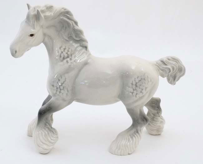 A Beswick model of a cantering Dapple Grey Shire Horse (1 of 6)