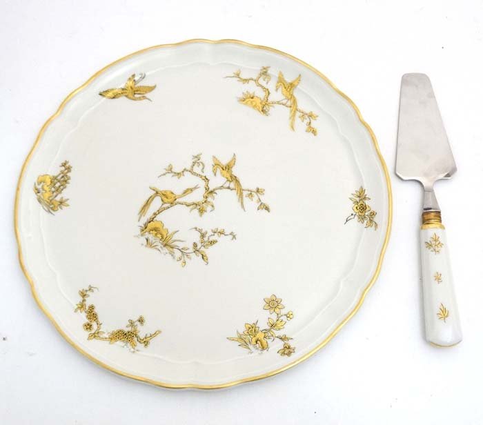 A 1957 L. Bernardaud & Co, Limoges, France: A 1957 L. Bernardaud & Co, Limoges, France Commemorative cake plate and matching ceramic handled cake slice, commemorating the first visit of Queen Elizabeth II to France in April 1957, the plate havi
