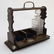 A late 19thC / early 20thC 3- bottle oak Tantalus with - 4