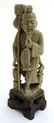 A jadeite carved Oriental figure of a fisherman