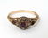 An 18ct gold ring set with central sapphire bordered by - 3