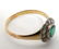 A 15ct gold ring set with central emerald bordered by - 2