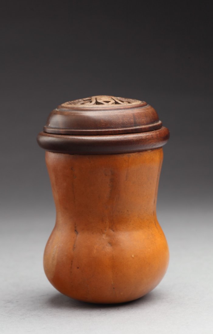 Moulded Gourd Cricket Container, Late Qing Dynasty: of gourd form, the exterior moulded to mimic a cricket pattern Dimensions: 9.5cm X 6cm