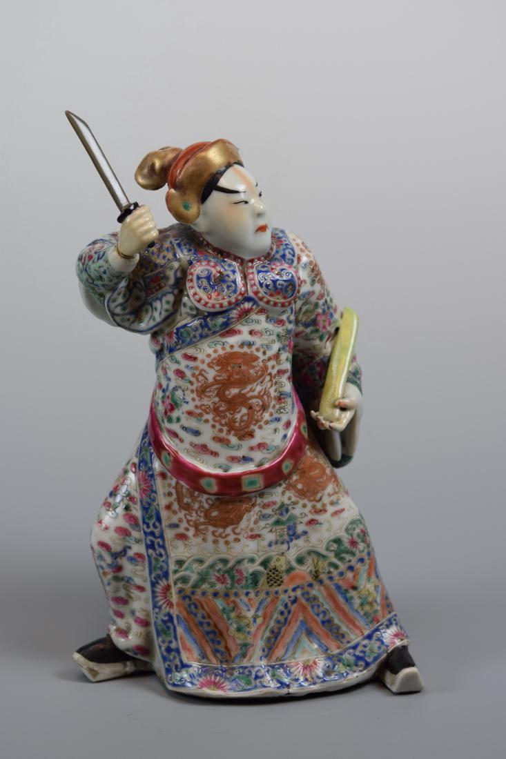 Chinese Porcelain Figurine with Knife (1 of 9)