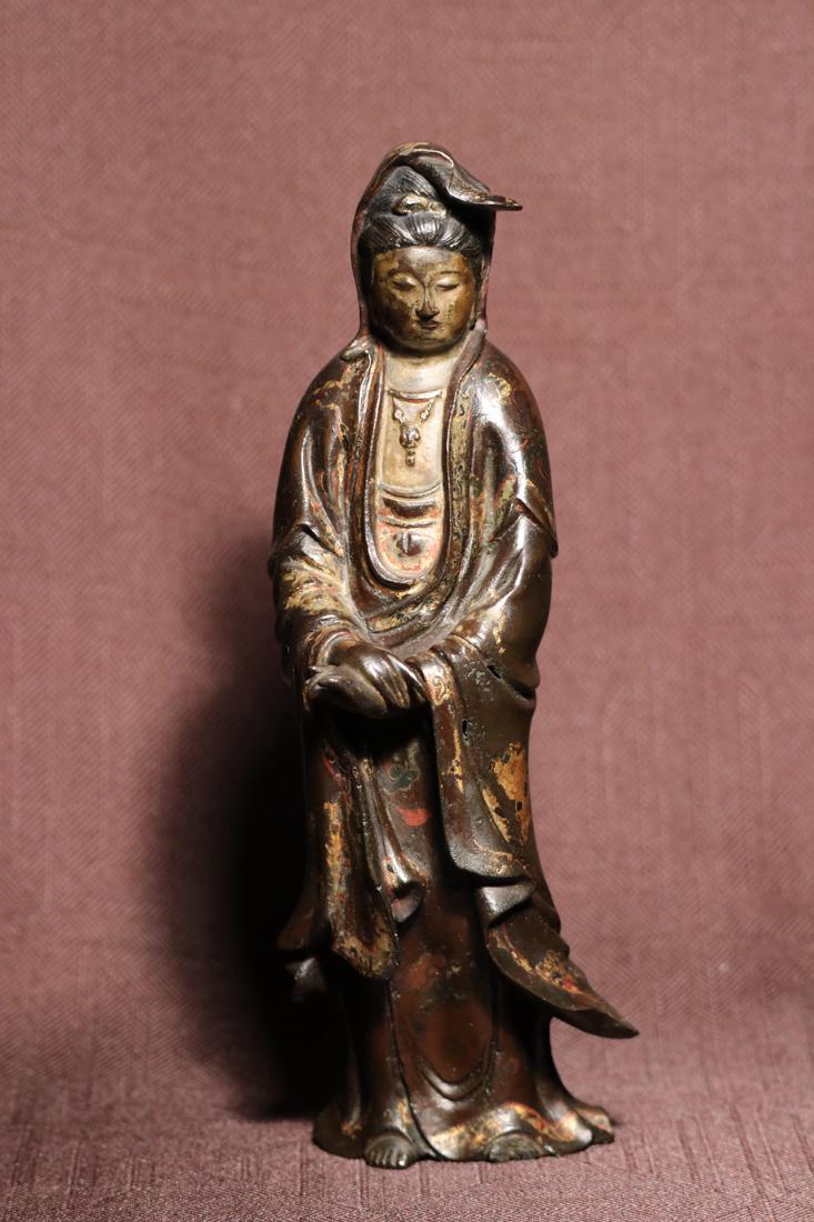 Chinese 17th cen Bronze Standing Kuanyin - Albert: Provenace: Property of Albert Gallatin, New York; with trace of lacquer, standing bronze kuanyin in elegant pose, left foot missing, lacquered face and body, measures 10.25" in height