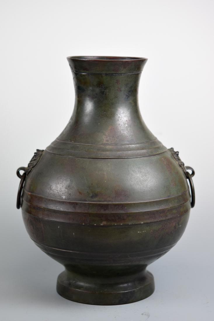 Chinese Bronze Vase with Robbed Shoulder: 17/18th cen, with beast ring handle and ribbed ring shoulder, measures 14.5" in height
