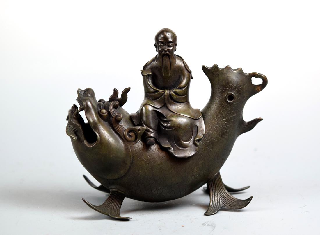 Chinese Bronze Shoulao on Dragon Fish: 18th cen, measures 7.5" wide and 6.75" in height; Provenace: from a Raleigh, North Carolina Estate