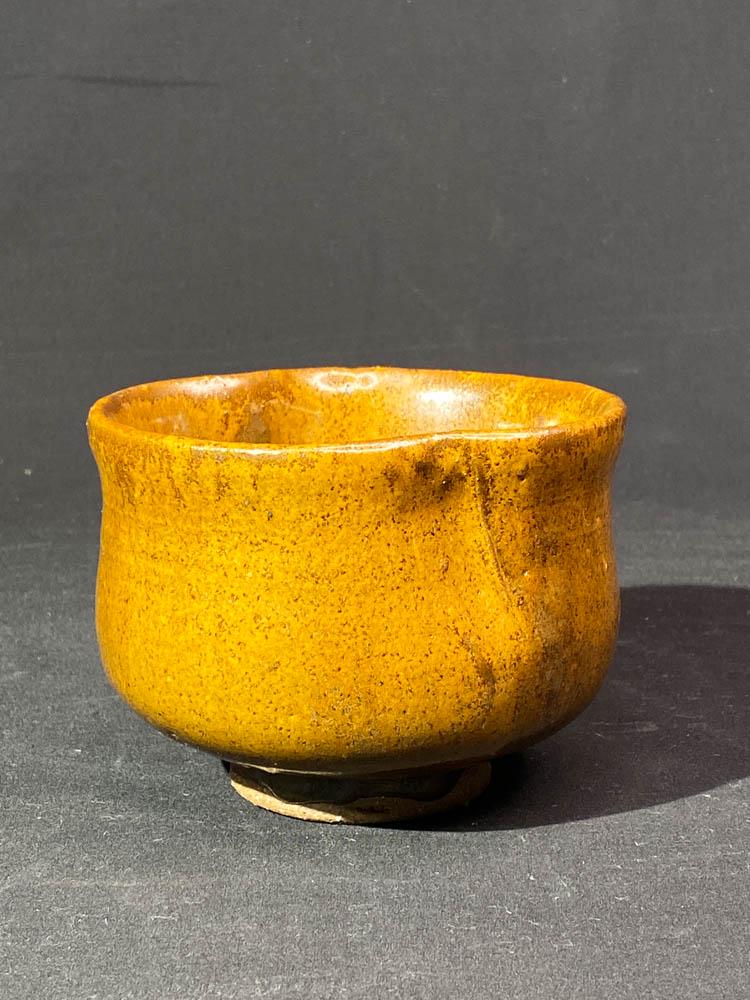 Japanese Studio Pottery Chawan - Pinched Rim: 20th cen, a signed japanese rust brown glazed chawan teabowl with pinched top tim design, 5"wide 3.5"ht